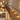 Warm staircase lighting with LED step lights, wall sconces and a multi-drop pendant in a modern Australian home.